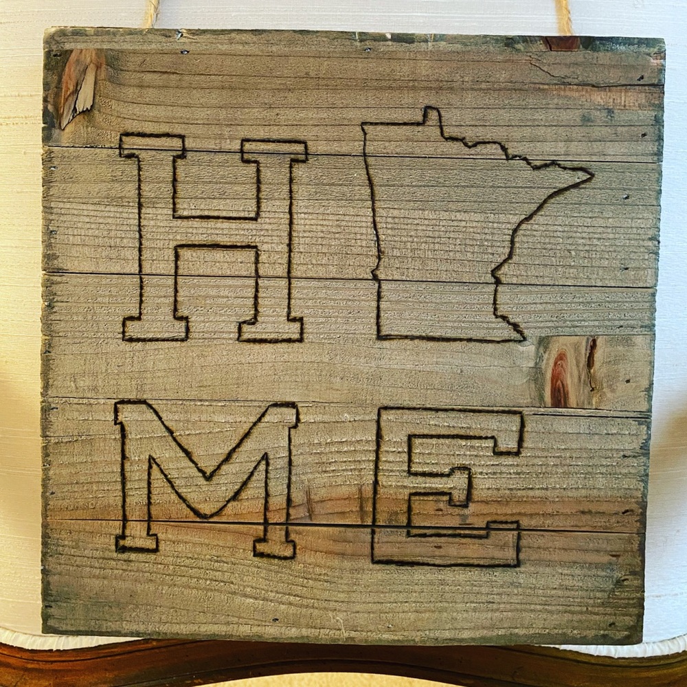 Custom wood burned state “Home” plaques.